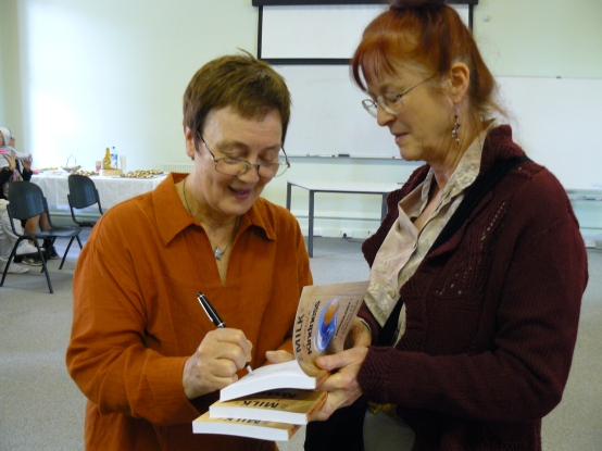 Judy McKinty and Ceridwen Masiulanis signing copies